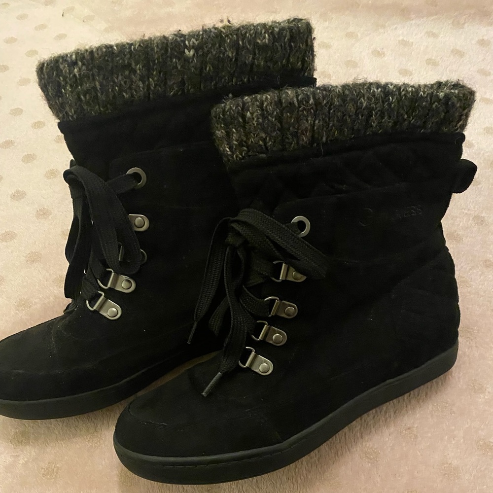 G by Guess women’s black felt boots.